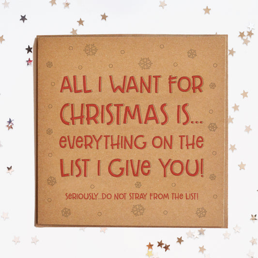 A funny Christmas card in festive colours and the message "All I Want For Christmas Is...Everything On The List I Give You! Seriously...Do Not Stray From The List!".