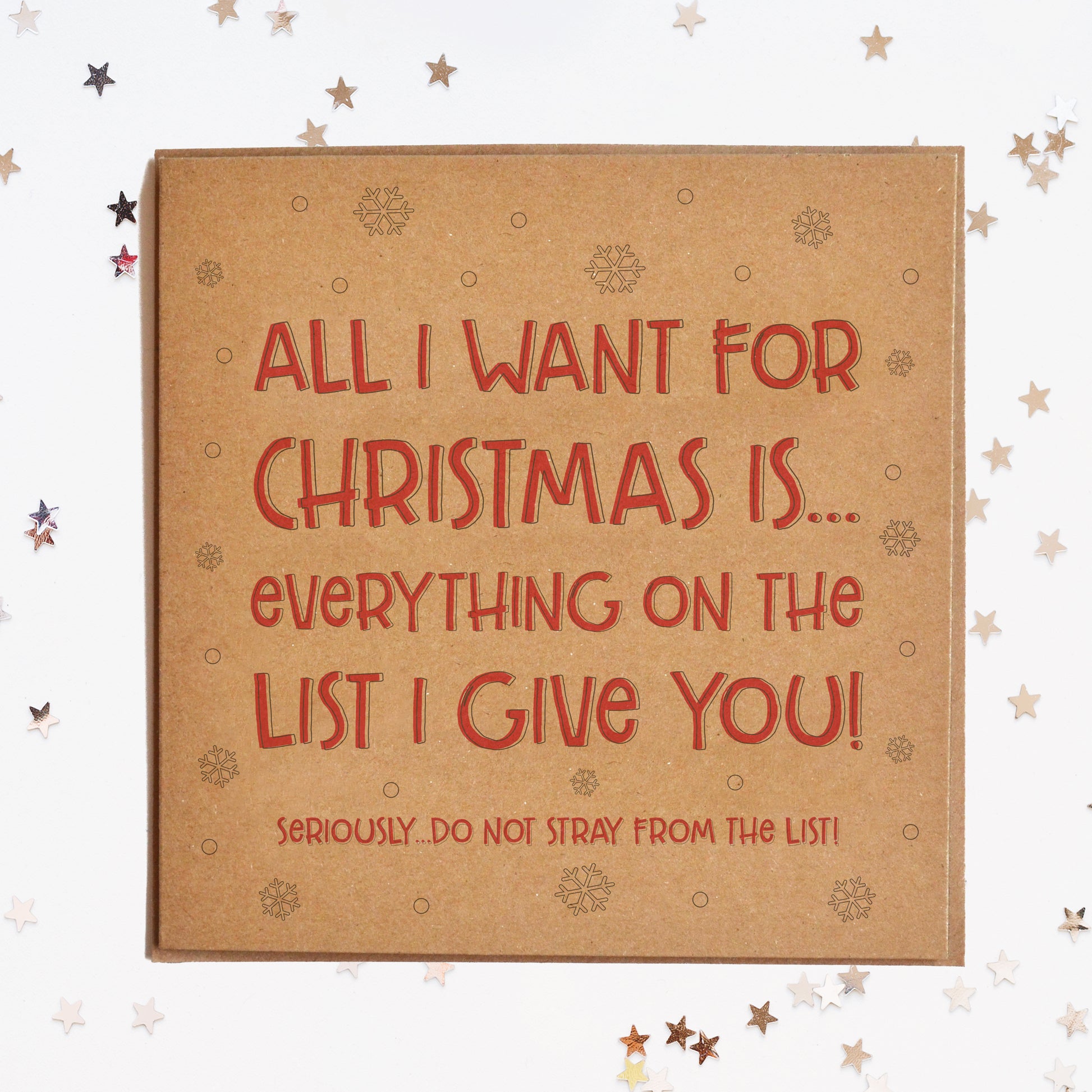 A funny Christmas card in festive colours and the message "All I Want For Christmas Is...Everything On The List I Give You! Seriously...Do Not Stray From The List!".