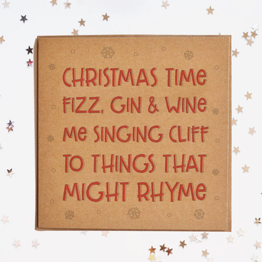 A funny Christmas card in festive colours and the message "Christmas Time...Fizz, Gin And Wine, me singing Cliff to things that might rhyme".