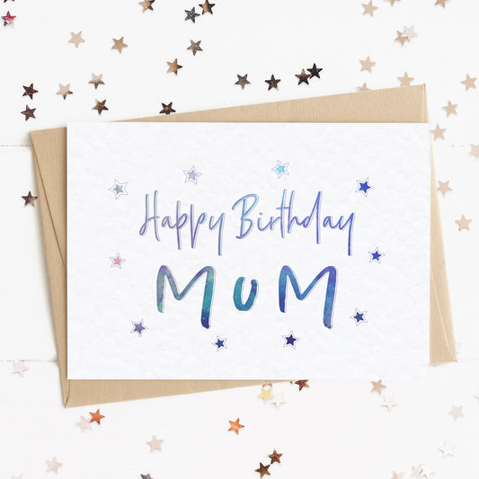 A mum birthday card with a stars and text in colours inspired by the northern lights/universe and the message, "Happy Birthday Mum".