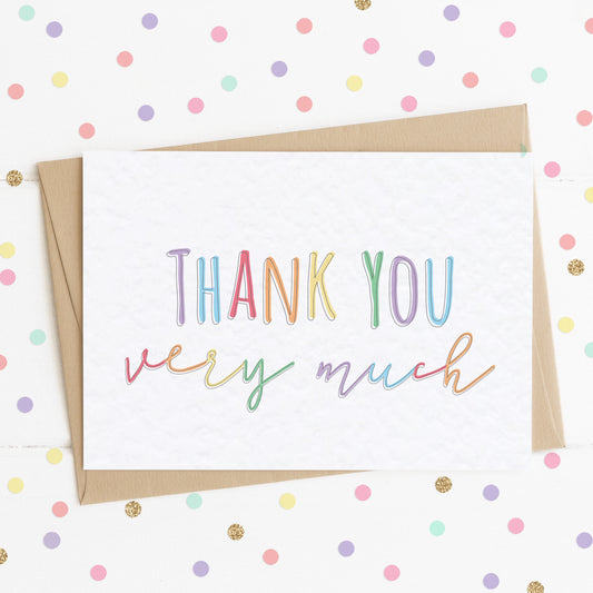 A vibrant thank you card with a colourful rainbow message saying "Thank You Very Much".