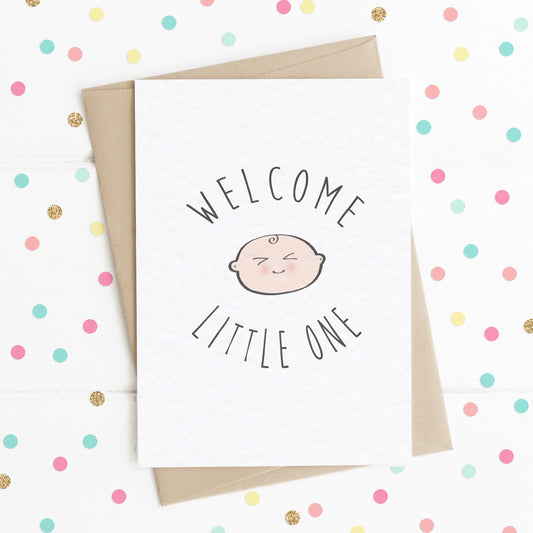 A Cute New Baby Card with a sweet smiling baby and the message "Welcome Little One!"