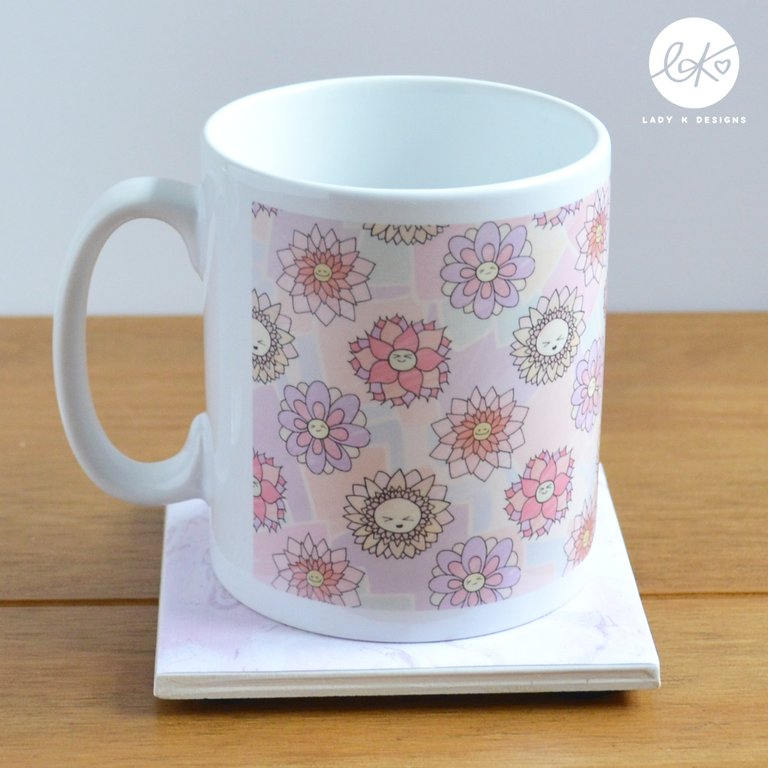 A cute and colourful happy floral ceramic mug/cup, with 4 happy smiling flower pattern design. Dishwasher and microwave safe.