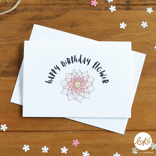 An A6 size card, with a cute smiling happy flower design, with the message "Happy Birthday Flower".