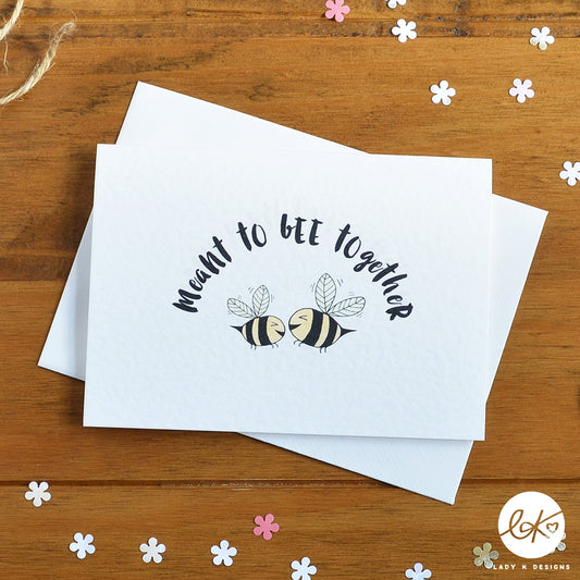 An A6 size card, with two cute smiling happy bees and the message "Meant To Bee Together".