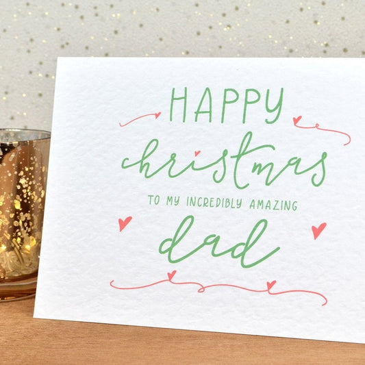 A fun and thoughtful Christmas card in festive colours and the message "Merry Christmas To My Incredibly Amazing Dad".