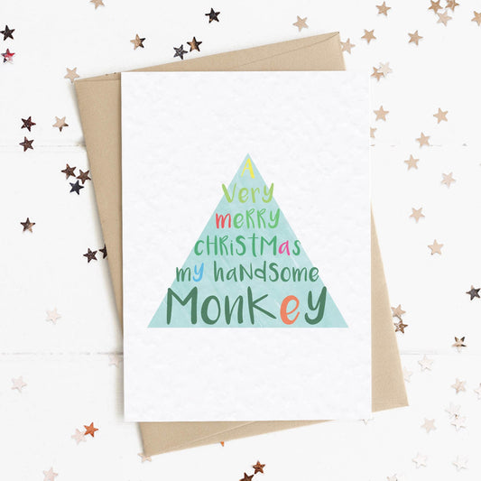 A fun and thoughtful card in festive Christmas tree design and colours with the message "A Very Merry Christmas My Handsome Monkey".