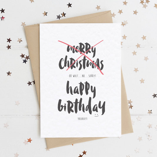 A funny birthday card with the message "MERRY CHRISTMAS....OOPS, NO WAIT.....HAPPY BIRTHDAY! YAY!".