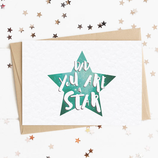 A special card for dad with a star in colours inspired by the northern lights/hygge and the message, "Dad, You Are A Star"..
